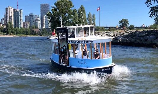 a falsecreek ferry underway near vanier park