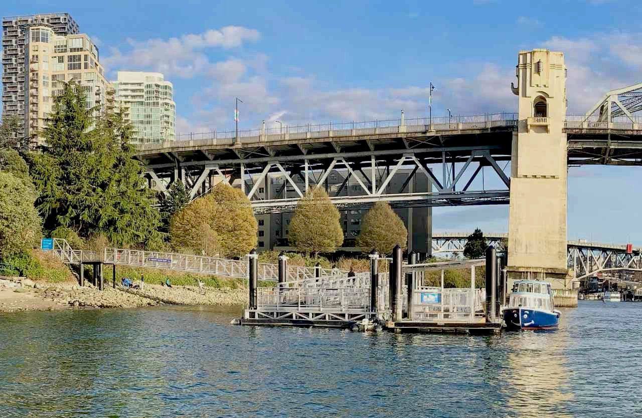 a ferry dock at sunset beach